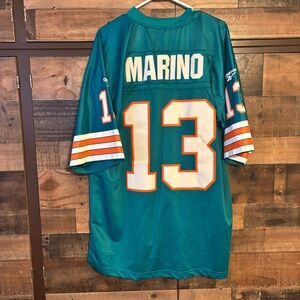 Marino Teal Jersey with Orange and White Details